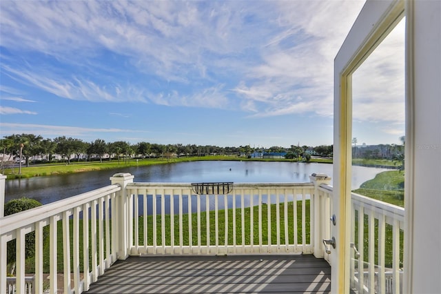 deck featuring a water view