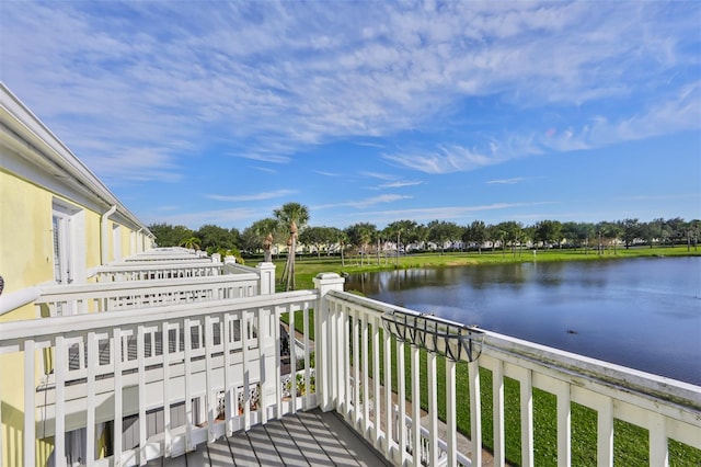 balcony featuring a water view