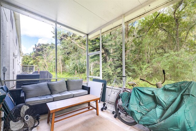 sunroom featuring a wealth of natural light