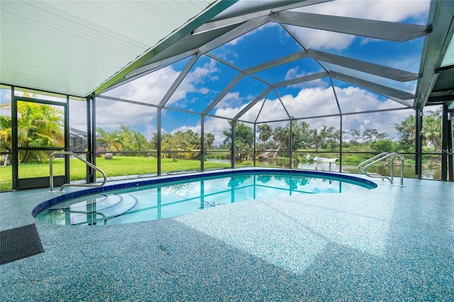 view of pool featuring a lanai and a patio area