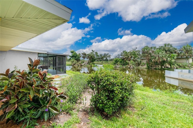 view of yard with a water view