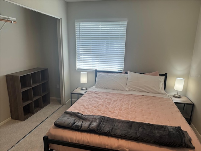 bedroom with light carpet