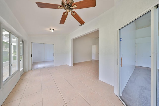 902 Mcdaniel St Unit 1, Sun City Center, FL 33573 - spare room featuring a ceiling fan and light tile patterned floors