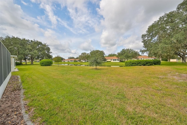 902 Mcdaniel St Unit 1, Sun City Center, FL 33573 - view of grassy yard