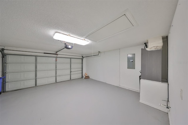 902 Mcdaniel St Unit 1, Sun City Center, FL 33573 - garage featuring electric panel and a garage door opener