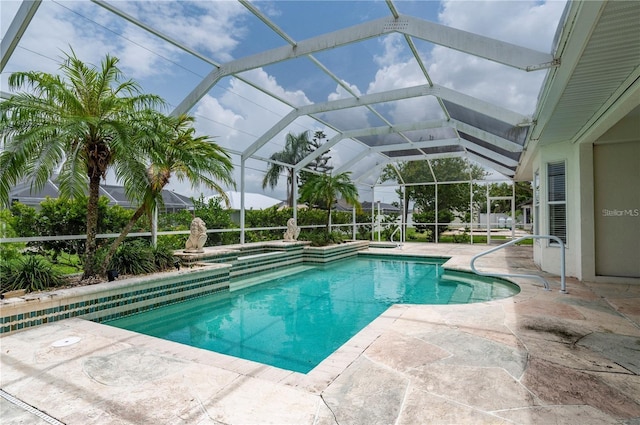 view of pool featuring a patio and a lanai