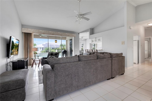 living room featuring high vaulted ceiling, ceiling fan, and light tile patterned floors