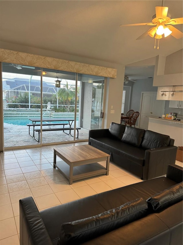 living room featuring ceiling fan and light tile patterned floors