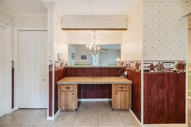 bathroom with crown molding, vanity, tile patterned floors, and a chandelier