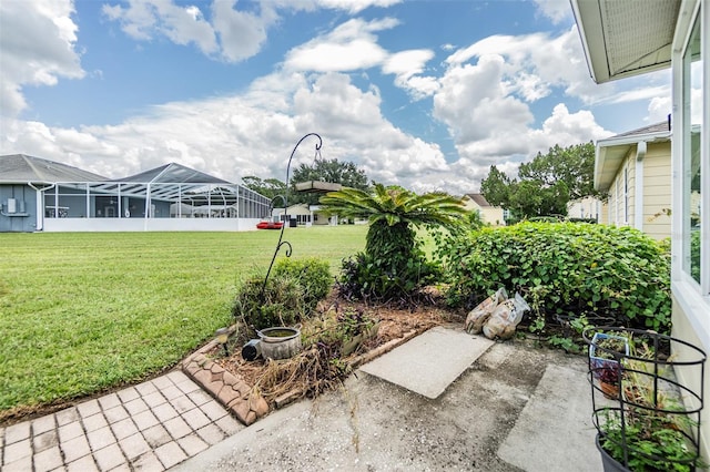 view of yard featuring a lanai