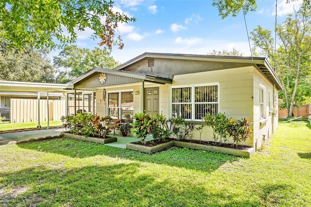 view of front of home with a front yard