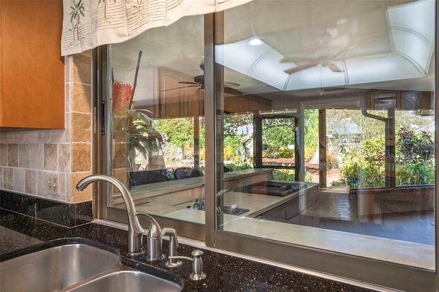 kitchen with ceiling fan and sink