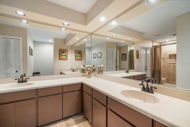 bathroom featuring vanity and walk in shower