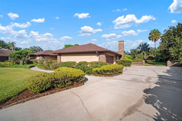 view of side of home with a garage