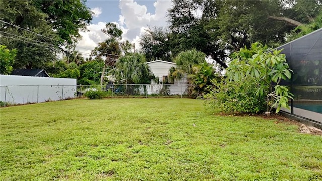 view of yard featuring a fenced backyard