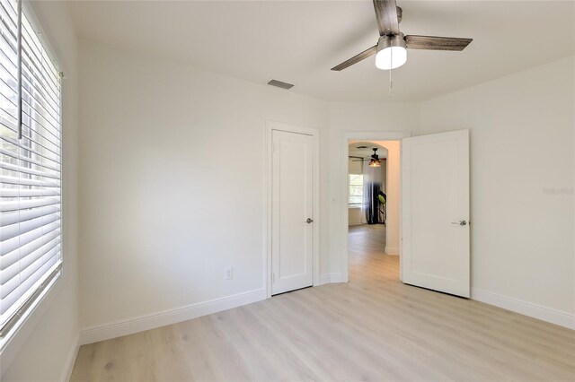 interior space featuring light hardwood / wood-style flooring and ceiling fan