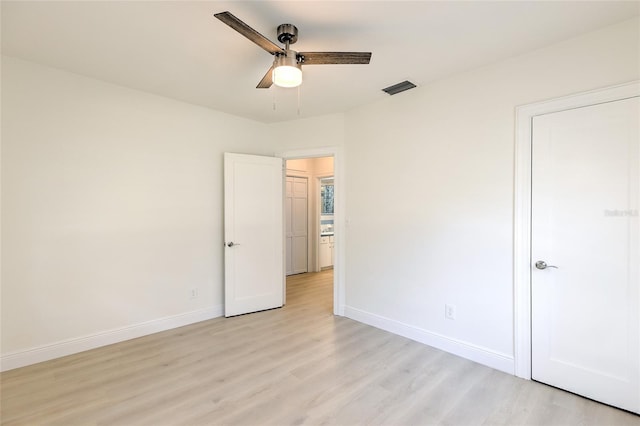 unfurnished bedroom featuring light wood-type flooring and ceiling fan