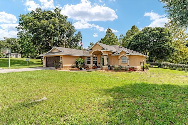 ranch-style house featuring a garage and a front yard