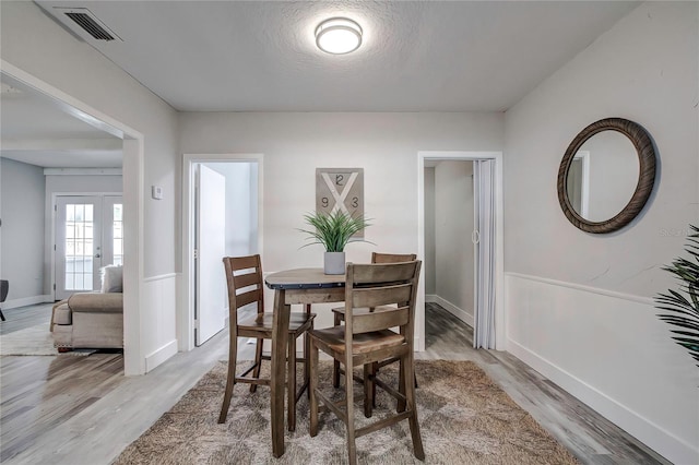 dining area featuring light hardwood / wood-style floors