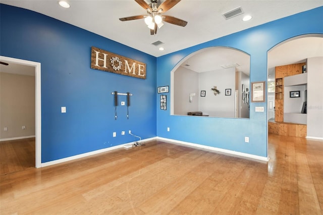 6843 Runner Oak Dr, Wesley Chapel, FL 33545 - empty room with ceiling fan, visible vents, and light wood-style flooring