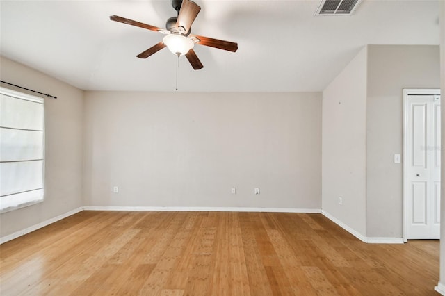 6843 Runner Oak Dr, Wesley Chapel, FL 33545 - spare room with light wood-style flooring, visible vents, ceiling fan, and baseboards