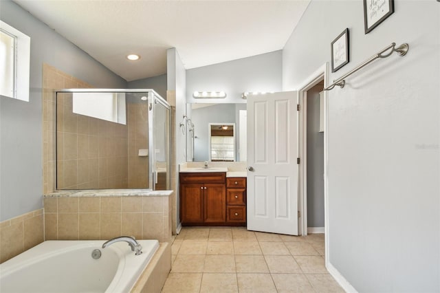 6843 Runner Oak Dr, Wesley Chapel, FL 33545 - bathroom with a stall shower, tile patterned floors, a bath, and vanity