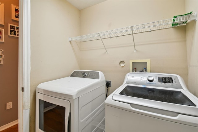 6843 Runner Oak Dr, Wesley Chapel, FL 33545 - laundry room featuring laundry area and washer and dryer