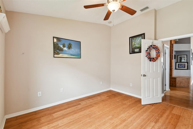 6843 Runner Oak Dr, Wesley Chapel, FL 33545 - unfurnished room with light wood finished floors, a ceiling fan, visible vents, and baseboards