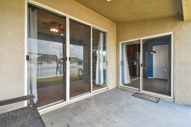 entrance to property featuring a patio area