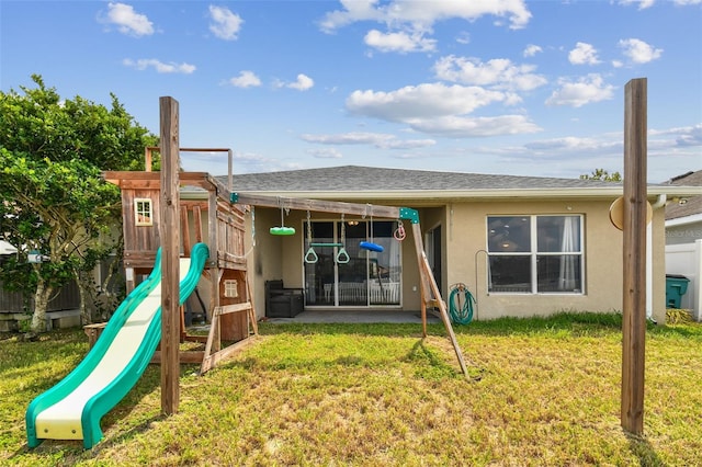 6843 Runner Oak Dr, Wesley Chapel, FL 33545 - view of jungle gym featuring fence and a yard