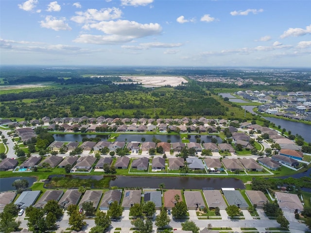 6843 Runner Oak Dr, Wesley Chapel, FL 33545 - birds eye view of property with a water view and a residential view