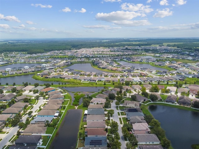 drone / aerial view with a water view