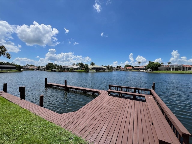 dock area with a water view