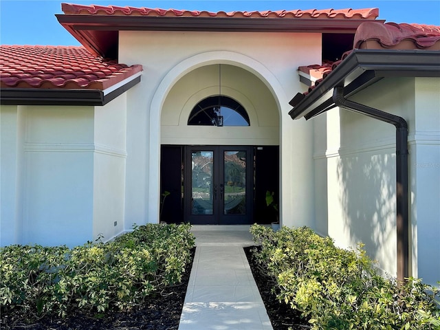 doorway to property featuring french doors