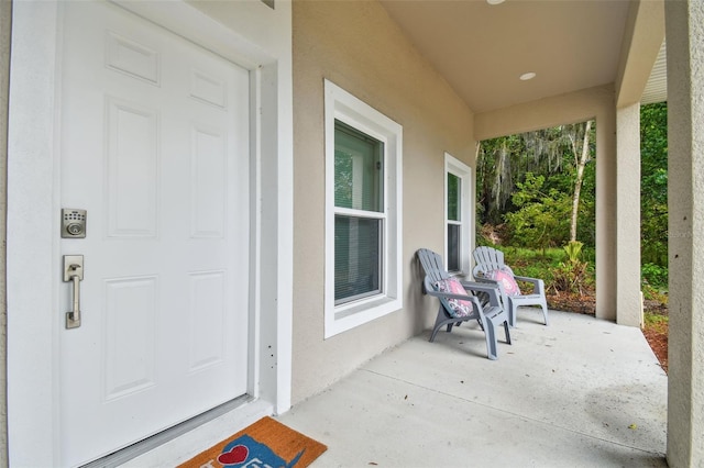 view of patio featuring a porch