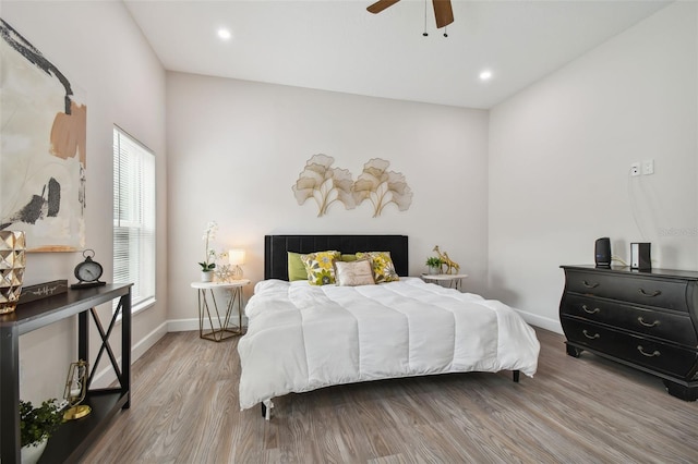 bedroom featuring recessed lighting, ceiling fan, baseboards, and wood finished floors