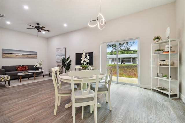 dining area with recessed lighting, visible vents, baseboards, and wood finished floors