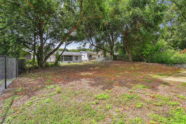 view of yard with fence