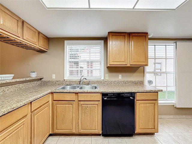 kitchen featuring a sink, light countertops, dishwasher, and light tile patterned flooring