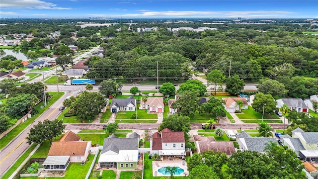 birds eye view of property with a residential view