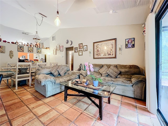 living room with lofted ceiling and visible vents