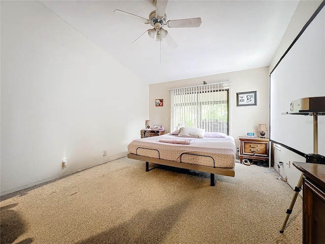 carpeted bedroom featuring a ceiling fan and lofted ceiling