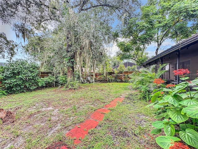 view of yard with a fenced backyard