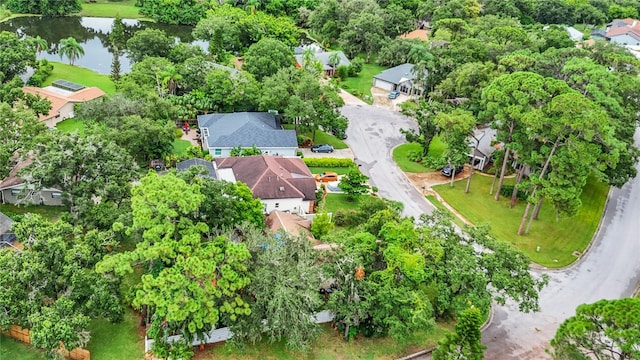 aerial view with a residential view and a water view