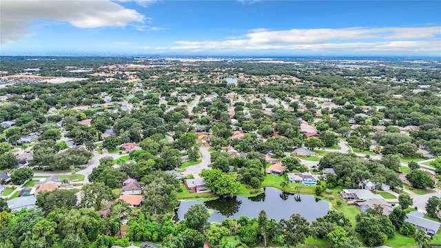 bird's eye view with a residential view and a water view