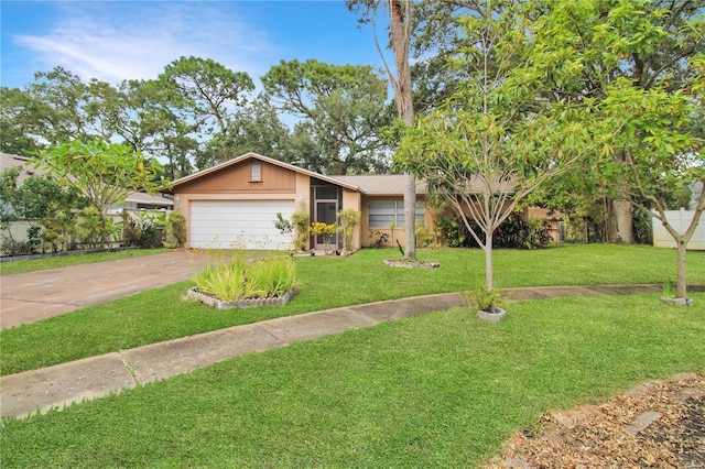 ranch-style house with a front yard and a garage