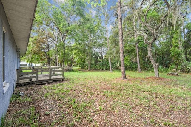 view of yard featuring a deck