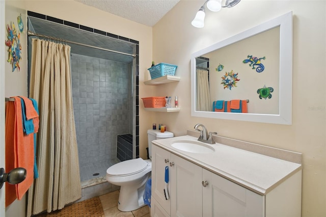 bathroom featuring tile patterned flooring, vanity, toilet, and walk in shower