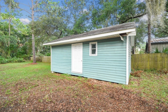 view of outdoor structure with a yard