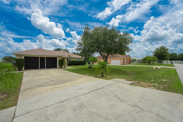 ranch-style house with a front yard and a garage